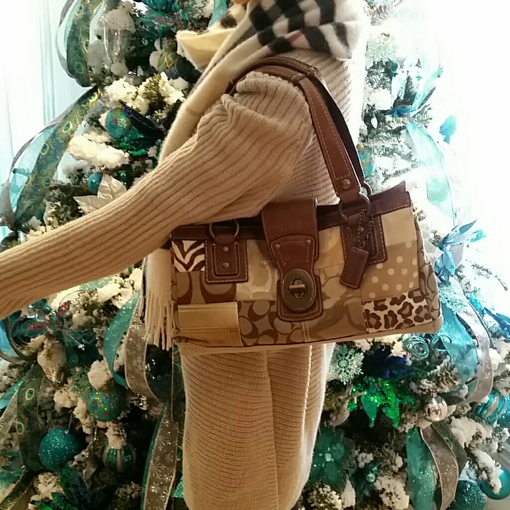 PRICE FIRM COACH ERGO HANDBAG🎈